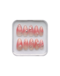 Set of jelly pink (translucent pink) press ons in a clear plastic case on a white background. Silver stars, silver gems, and pearl star, and pearl detailing. 