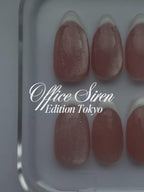 Office Siren: Edition Tokyo Jelly Nails. Pink Cat Eye Almond nails with white french tips. 